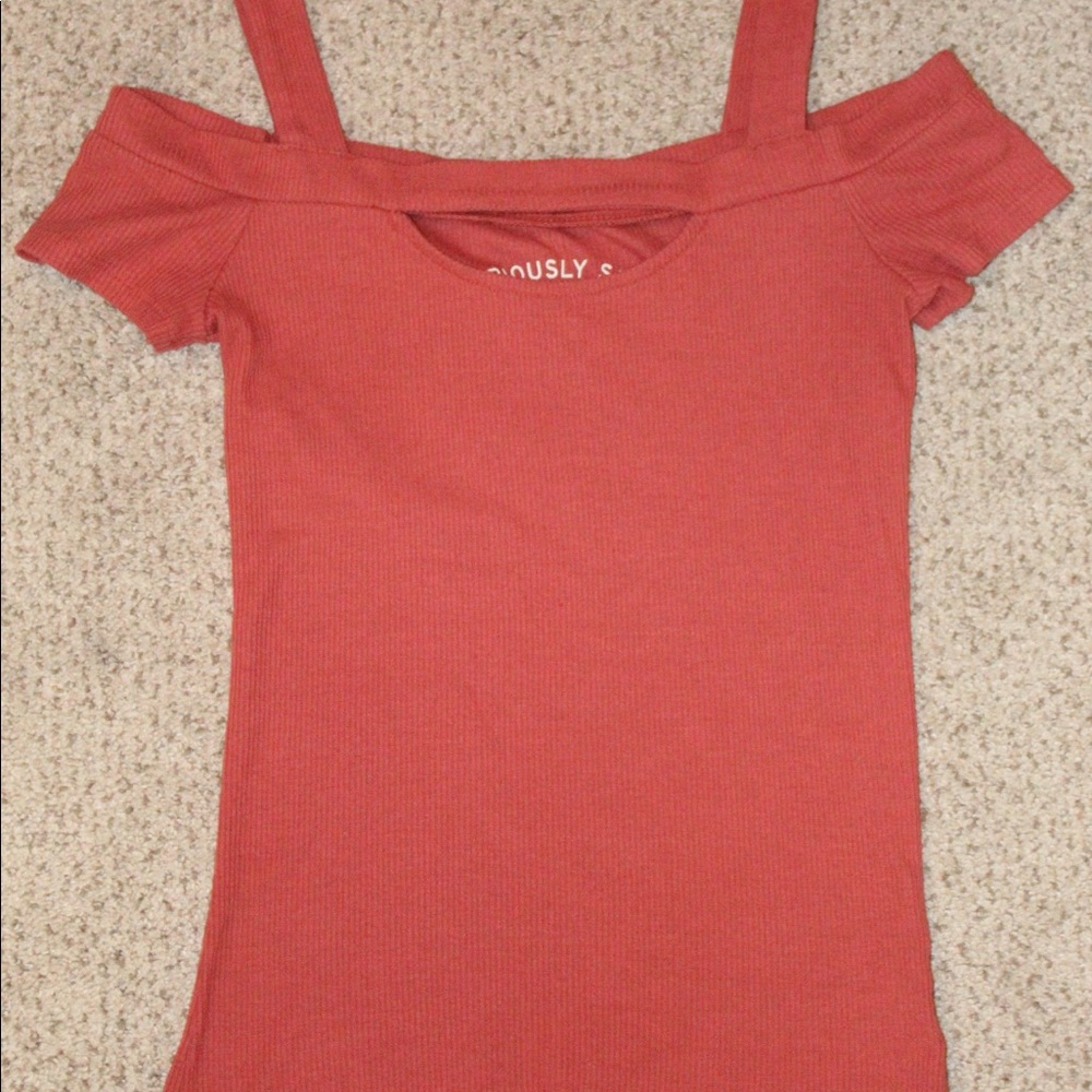 Strap off the shoulder cut out shirt